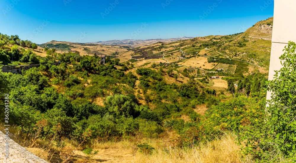 Fields and vegetation in the Madonie Mountains, Sicily viewed from Petralia Sottana during summertime