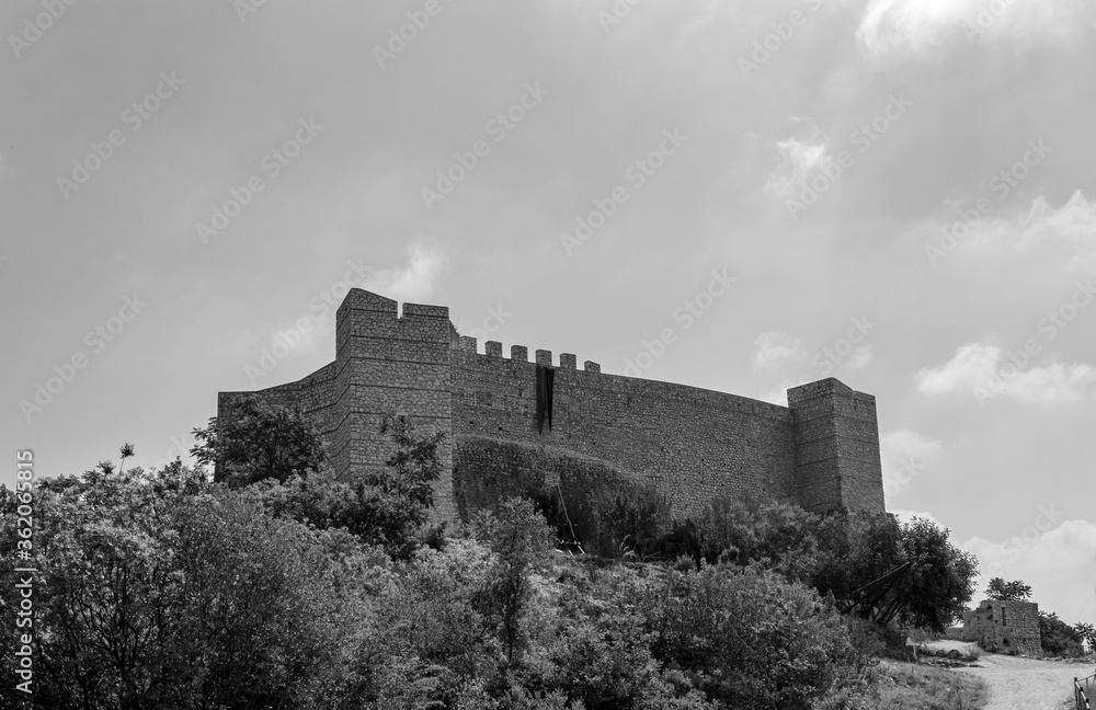 Black and white photo of medieval castle facade in Italy Black and white photo of medieval castle facade in Italy