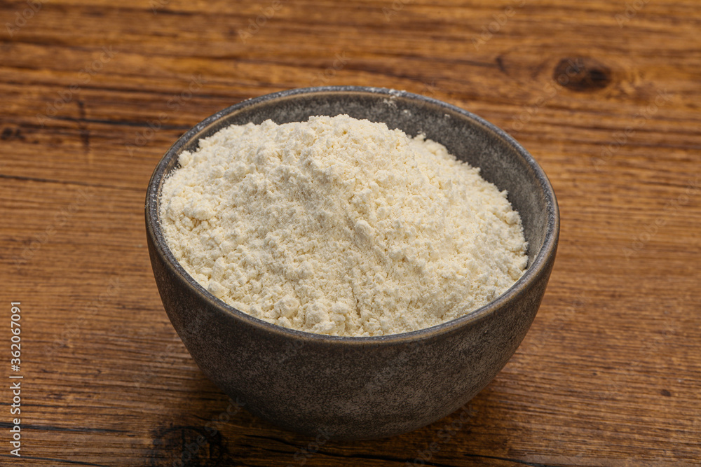 Wheat flour heap in the bowl Wheat flour heap in the bowl