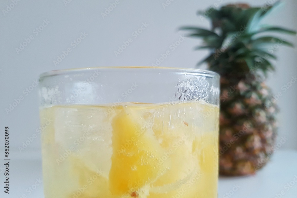 pineapple juice in glass with pineapple pineapple juice in glass with pineapple