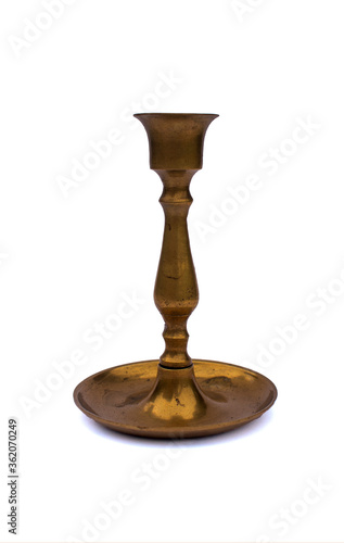 Gold antique bronze candlestick isolated on white studio background