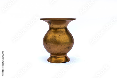 Old rusty bronze / copper / clay golden vase / pot isolated on white studio background 