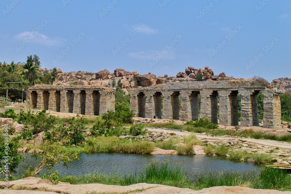 Old stone bridge created under the Vijayanagara Empire Connecting Hampi with Hippie island