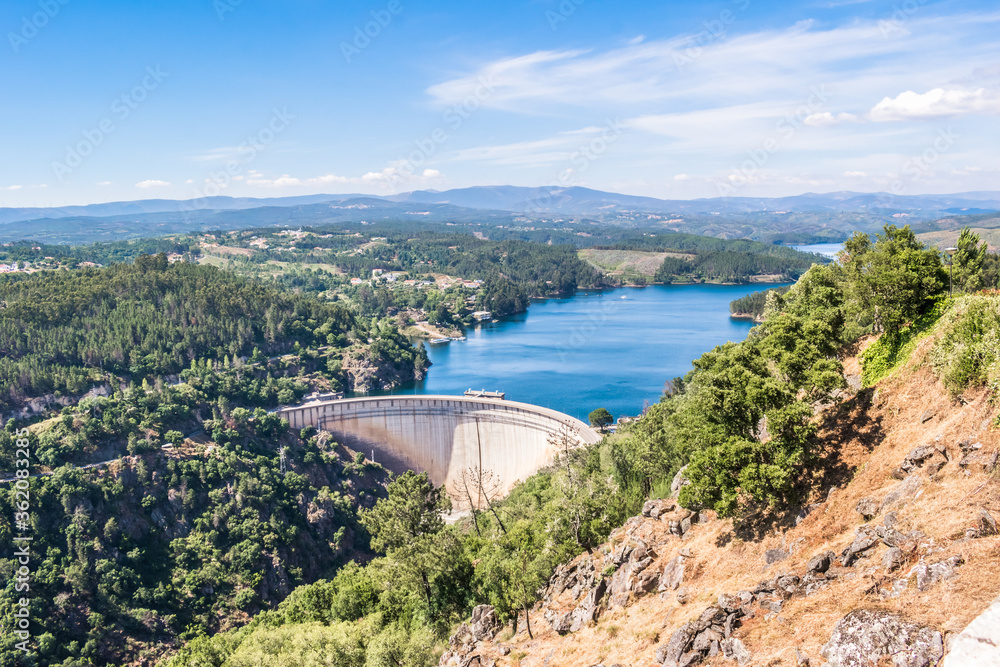 Aerial and panoramic view over the Cabril Dam and the Zêzere River with degraded mountains in the background, Pedrogão Pequeno - Sertã PORTUGAL
