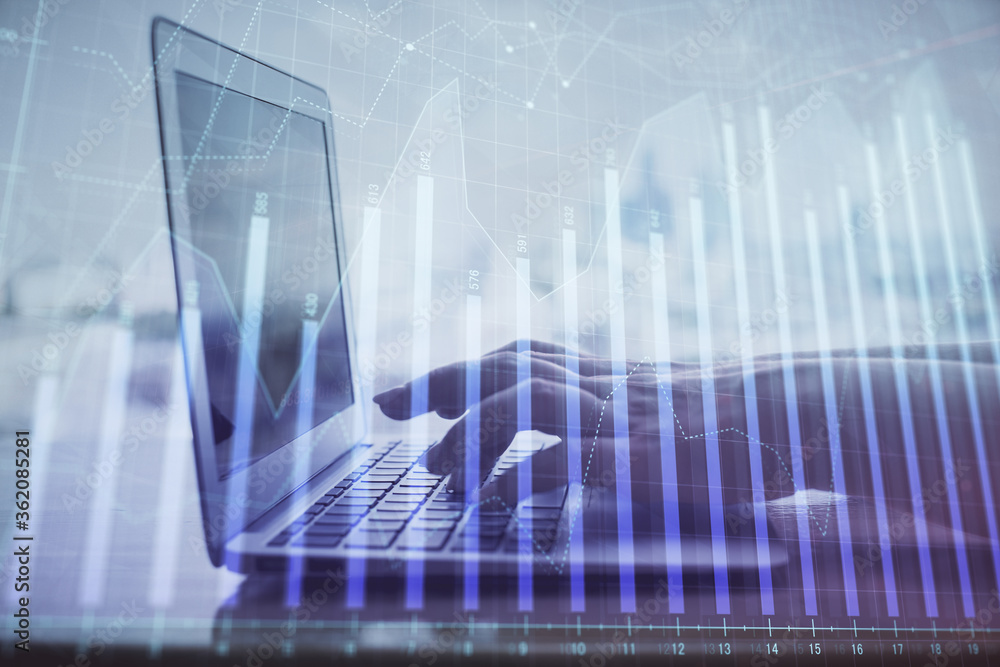 Double exposure of woman hands typing on computer and forex chart hologram drawing. Stock market analysis concept. Double exposure of woman hands typing on computer and forex chart hologram drawing. Stock market analysis concept.