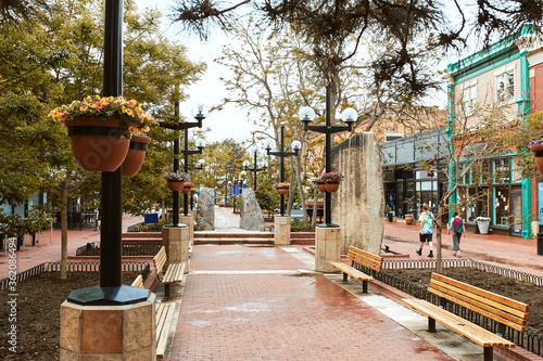 Benches and boulder rock features along Pearl Street Mall, a pedestrian mall in Boulder County.  Boulder, Colorado, USA