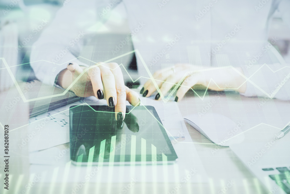 Double exposure of forex chart sketch hologram and woman holding and using a mobile device. Financial market concept. Double exposure of forex chart sketch hologram and woman holding and using a mobile device. Financial market concept.