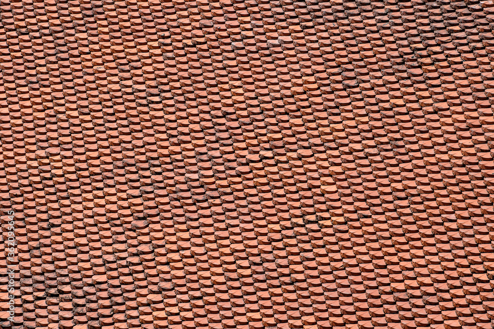 Fototapeta premium Red roof tiles in a Buddhist temple near the city of Danang Vietnam. Top view