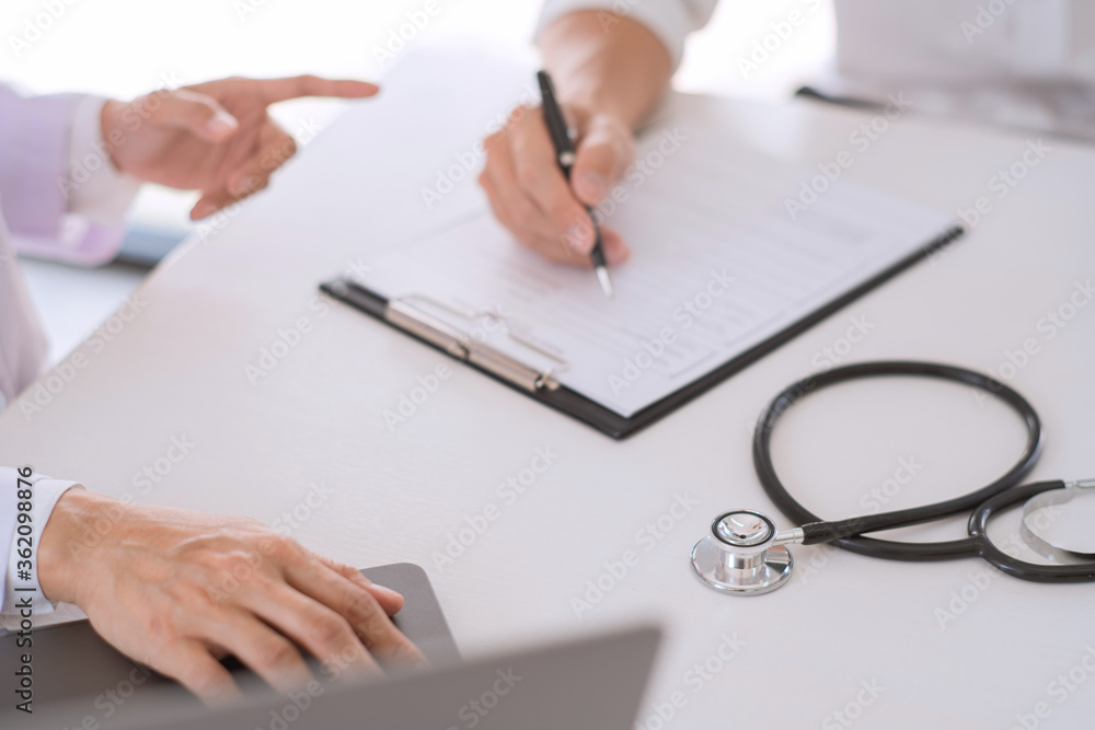 doctor giving consulting and diagnostic to patient and explaining medical information prevention disease doctor giving consulting and diagnostic to patient and explaining medical information prevention disease