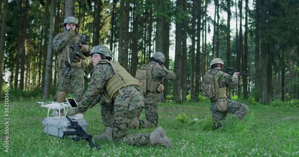 Army engineer using drone to monitor enemy and complete military action Army engineer using drone to monitor enemy and complete military action