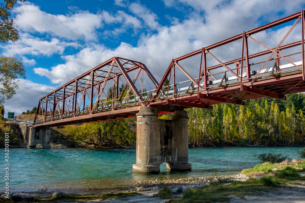 Naklejka premium The Red Bridge on Highway 8A where it crosses the Upper Clutha River, South Island, New Zealand