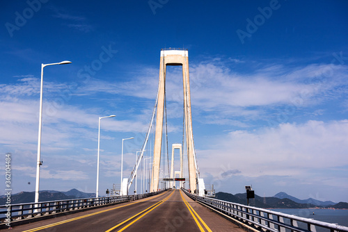 The gigantic grand bridge and beautiful skyline panorama. © Chongbum Thomas Park