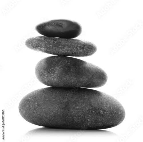 Spa stones on white background