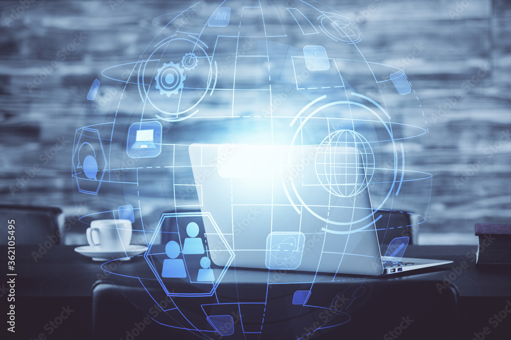 Computer on desktop with social network hologram. Double exposure. Concept of international people connections. Computer on desktop with social network hologram. Double exposure. Concept of international people connections.
