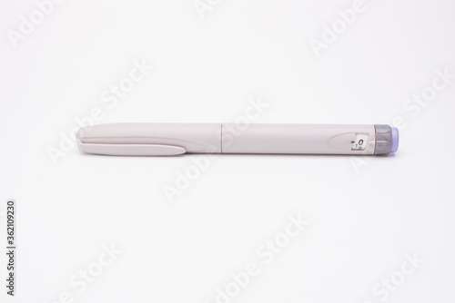 Insulin pen isolated over white