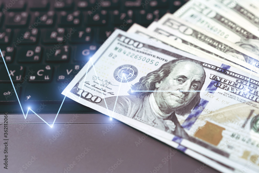 Dollar currency, American Dollars Cash Money with Keybord Computer, Business Success concept with Stock market or forex trading graph. Dollar currency, American Dollars Cash Money with Keybord Computer, Business Success concept with Stock market or forex trading graph.