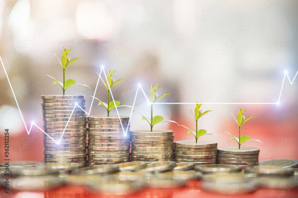 step of coins stacks, money, saving and investment or business planning concept with Stock market or forex trading graph..
