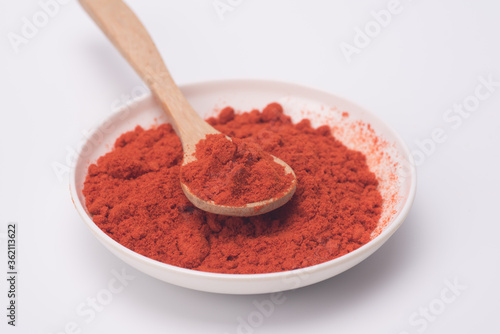 Chili powder isolated over grey background
