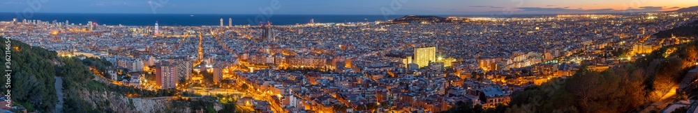 Barcelona - The panorama of the city with the at the dusk.