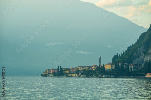 Amazing mountain landscape of Como lake and village of Varenna at early morning, Province of Lecco, Italy.