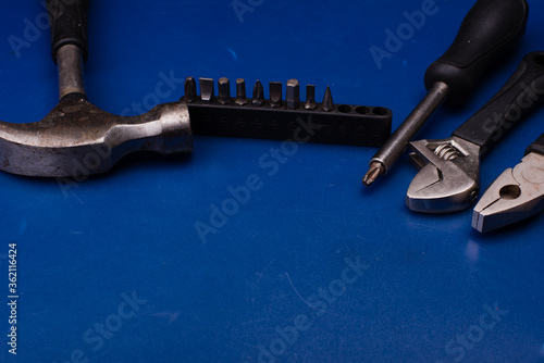 Set of tools over blue background