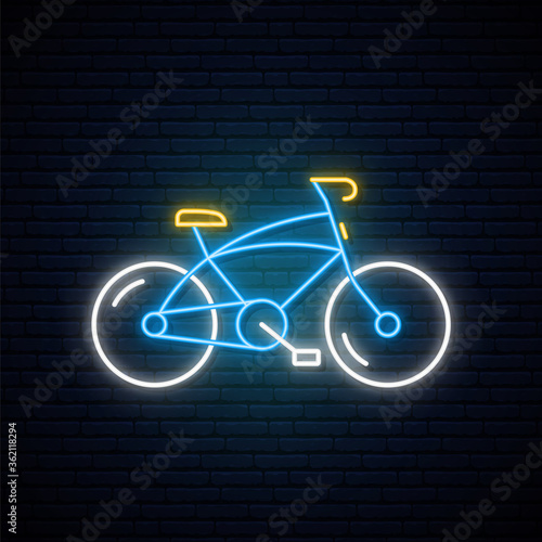 Neon bicycle sign. Glowing neon mountain-bicycle emblem on dark brick wall background. Bright light signboard. Vector illustration.