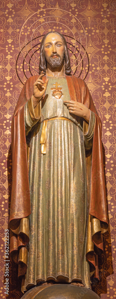 BARCELONA, SPAIN - MARCH 3, 2020: The carved polychrome sculpture of Heart of Jesus of the church Iglesia Santa Maria de Gracia de Jesus.