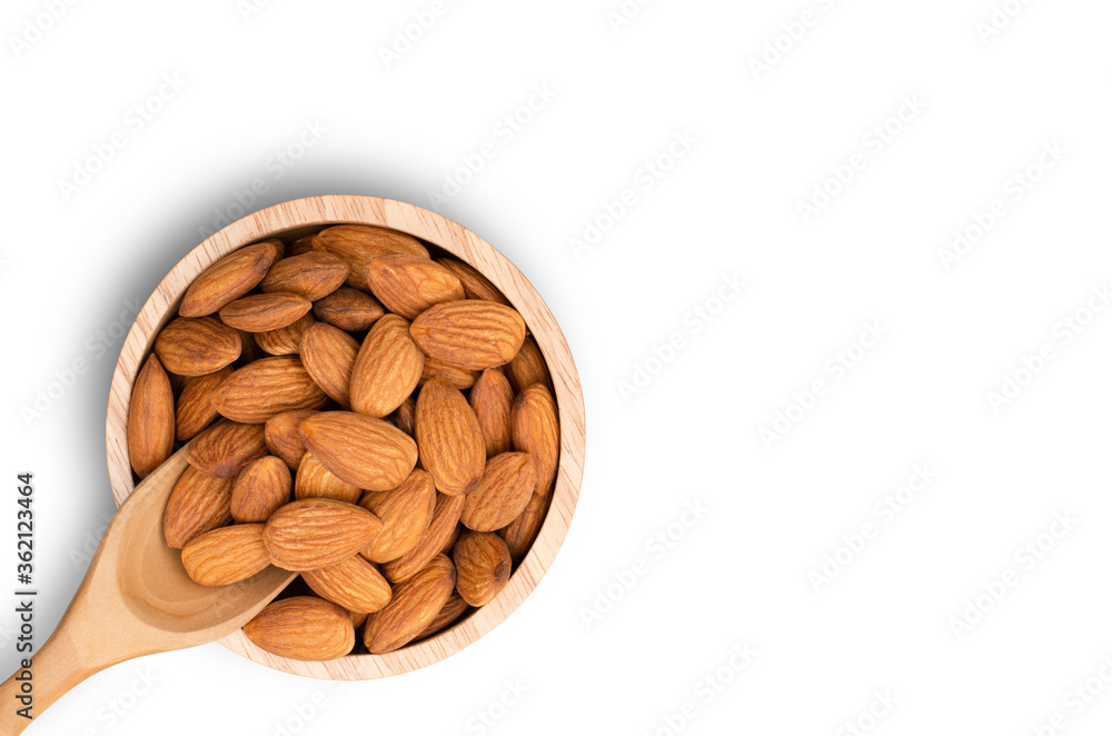 almonds in a bowl isolated on white. almonds in a bowl isolated on white.