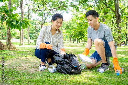 Sticker Team volunteers collecting garbage in public park