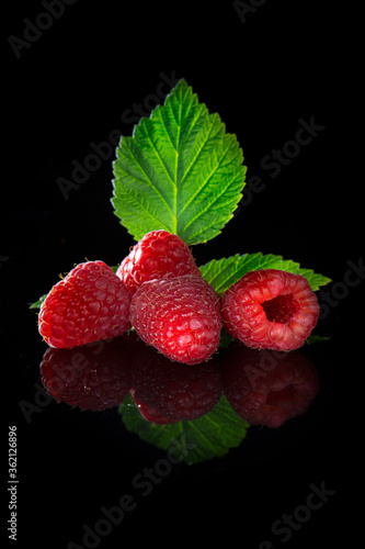 raspberry on green leaf food fruit
