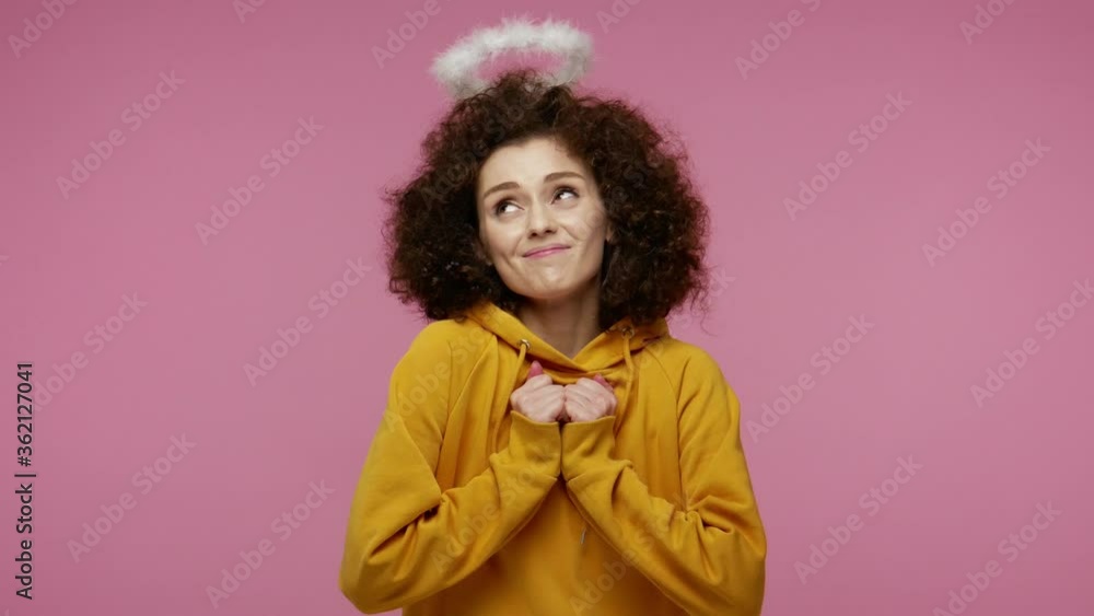 Come into my arms! Kind-hearted angelic girl afro hairstyle with saint nimbus giving free hugs, outstretching hands to embrace, sending air kiss, sharing love care. indoor studio shot isolated Come into my arms! Kind-hearted angelic girl afro hairstyle with saint nimbus giving free hugs, outstretching hands to embrace, sending air kiss, sharing love care. indoor studio shot isolated