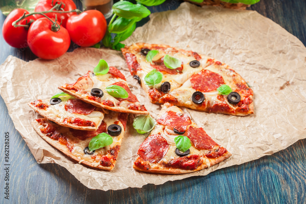 Slices of pizza pepperoni with olives Slices of pizza pepperoni with olives