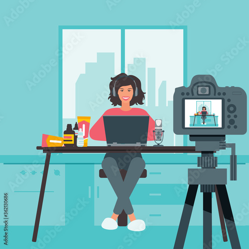 Video blogger recording video with camera and light. Vlog concept.
Cute vector illustration in flat style
