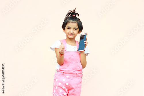 Indian little girl with mobile phone