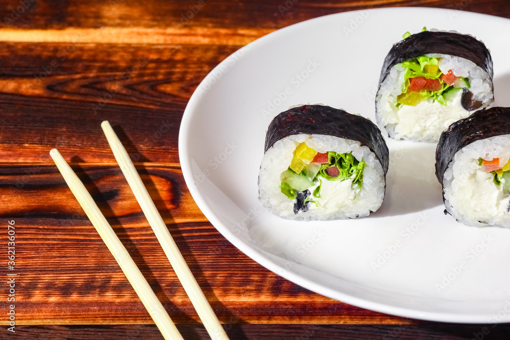 sushi on a wooden background close up sushi on a wooden background close up