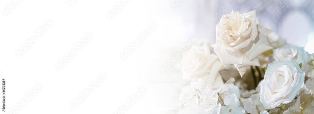 Wedding flower arrangements and decorations. Empty copyspace with white background and space for text. Holiday accessories and backgrounds