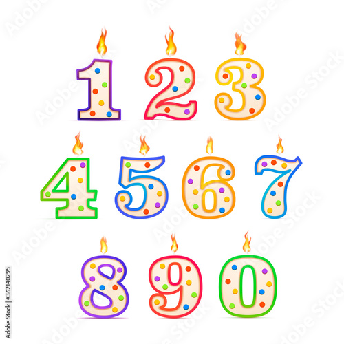 The birthday candles in the different numbers form with fire on white