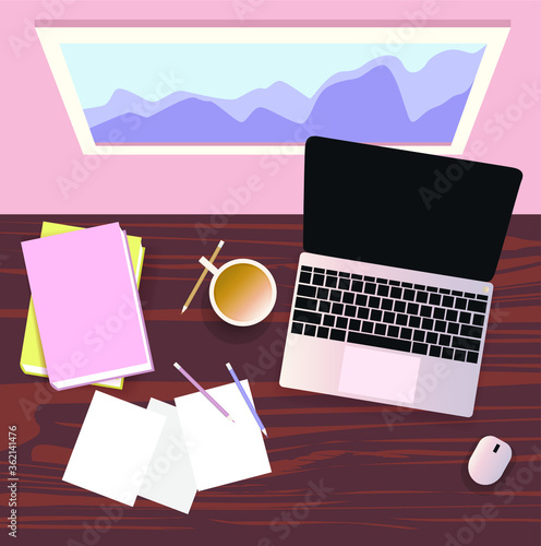 Home workspace. Laptop on wooden table. Cup of coffee. Pencils and books. Top view. Freelance