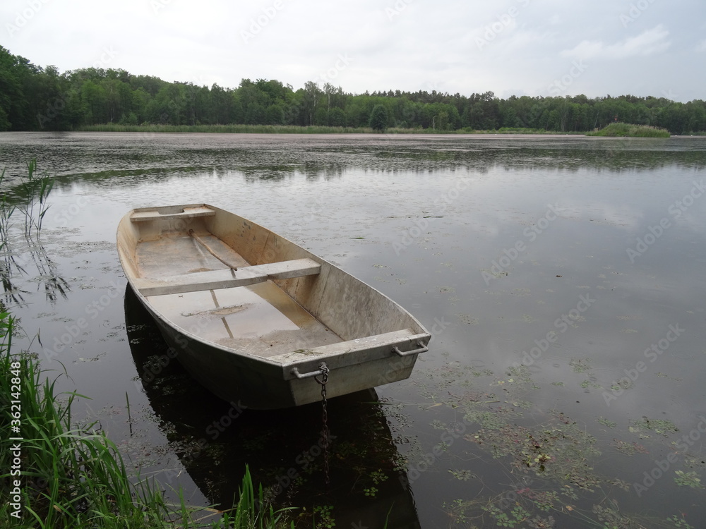 Landscape: boat on the lake in soft light.