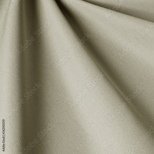Solid cream beige fabric background. Fabric with natural texture, Cloth backdrop.