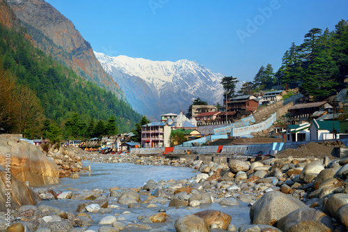 View of Gangotri town with mountains and holy ganga river. Uttarakhand, India.