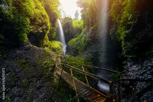 Curug Aseupan. Beautiful waterfalls in Bandung, West java Indonesia. Perfect for wallpaper or natural concept background.  photo