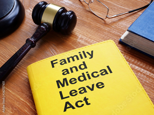 FMLA - Family and Medical Leave Act is shown on the conceptual business photo photo