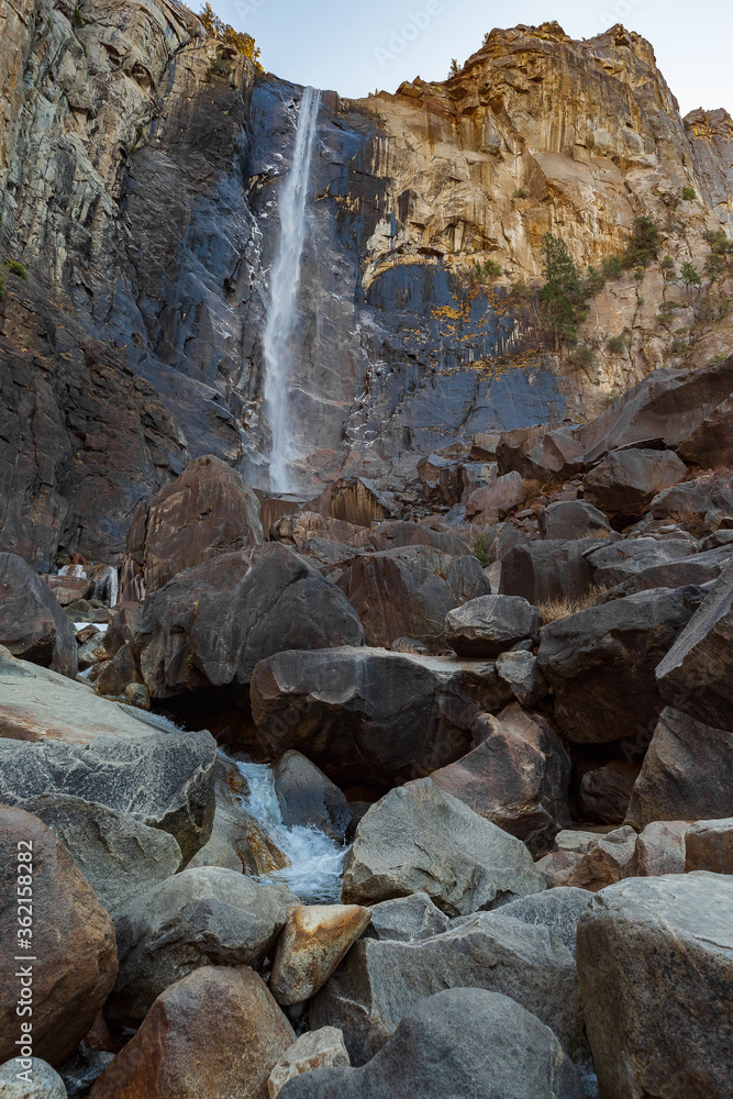A view of the winter Bridalveil Fall and the huge river rocks of Yosemite Park, California. A view of the winter Bridalveil Fall and the huge river rocks of Yosemite Park, California.
