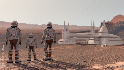 Foto Family colonists immigrants to Mars, a man, a woman and a child admire the Martian landscape, the city and spaceship