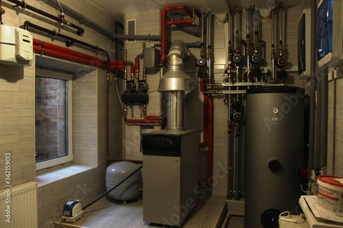 Russia, Moscow-May 2019: hot water gas boiler room with a heating system.