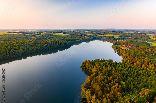 Summer morning landscape on the lake aerial view