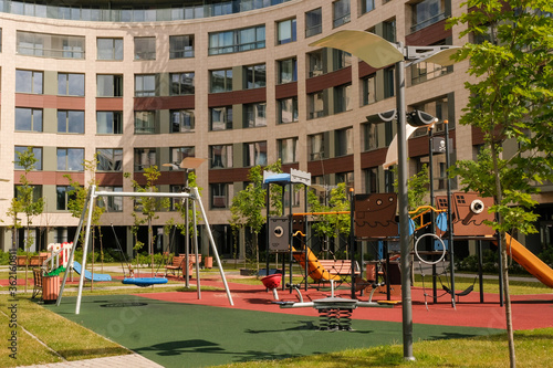  playground in the courtyard of a residential building © Elena