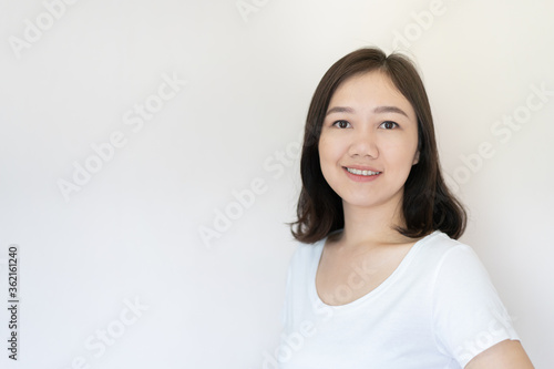 Portrait of Asian beautiful woman age around 25 - 30 years old on white background with copy space. 