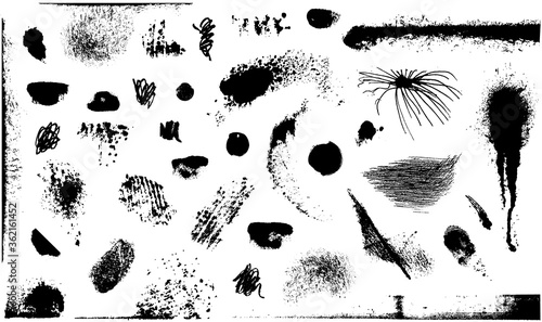 A set hatched grunge spots and blots. Spots and blots are drawn with a pencil, brush, crayons and sprayed from a spray can. Different shape splashes. Set of watercolor stains. Black and white graphics